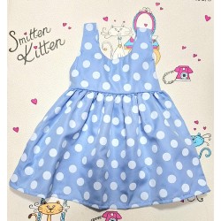 Детска лятна рокля в светло синьо на бели точки с панделка на гърба