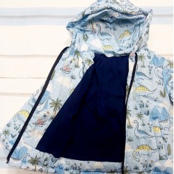 Бебешко преходно яке с качулка в синьо с динозаври Бебешко преходно яке с качулка в синьо с динозаври