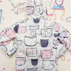 Бебешко преходно шушляково яке в бяло на котета