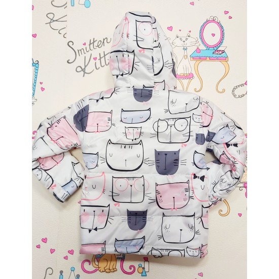 Бебешко преходно шушляково яке в бяло на котета