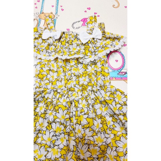 Лятна детска рокля в жълто с голи рамене
