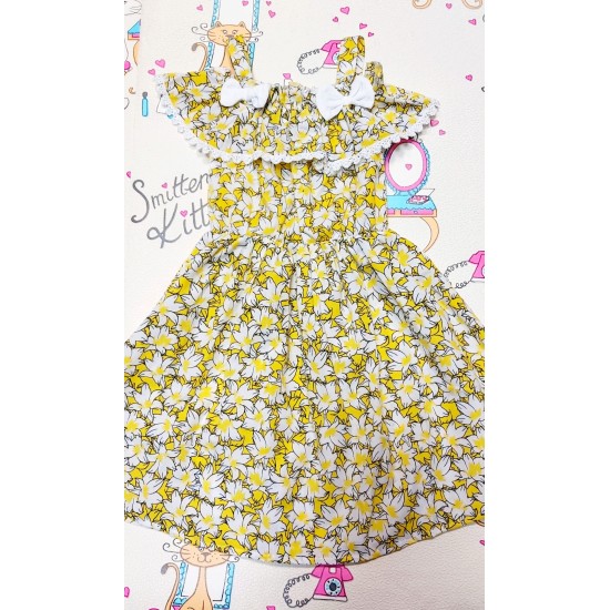 Лятна детска рокля в жълто с голи рамене