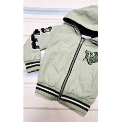 Детско шушляково непромокаемо яке в светло зелено Дино Детско шушляково непромокаемо яке в светло зелено Дино