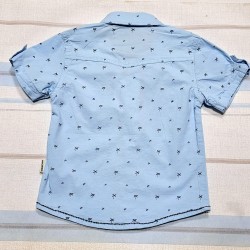 Детска лятна риза в светло синьо с якичка и джобчета Детска лятна риза в светло синьо с якичка и джобчета