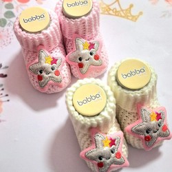 Бебешки плетени терлички в бяло или розово  Звездички