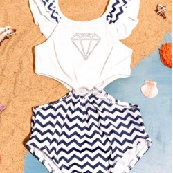 Детски цял бански в бяло и тъмносиньо с изрязани детайли Диамант Детски цял бански в бяло и тъмносиньо с изрязани детайли Диамант