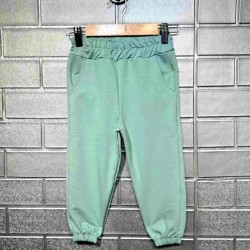 Детско памучно спортно долнище в зелено Детско памучно спортно долнище в зелено