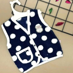 Бебешки пухкав елек в тъмносиньо на бели точки Бебешки пухкав елек в тъмносиньо на бели точки