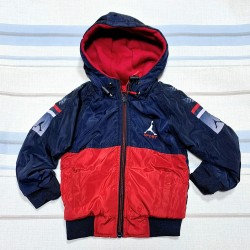 Детско двулицево шушляково преходно яке в синьо и червено Детско двулицево шушляково преходно яке в синьо и червено