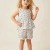 Детски летен комплект с къси панталонки в бяло с цветчета ЛИЛИ Детски летен комплект с къси панталонки в бяло с цветчета ЛИЛИ