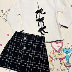 Детски комплект с пола и блуза в бяло и черно каре